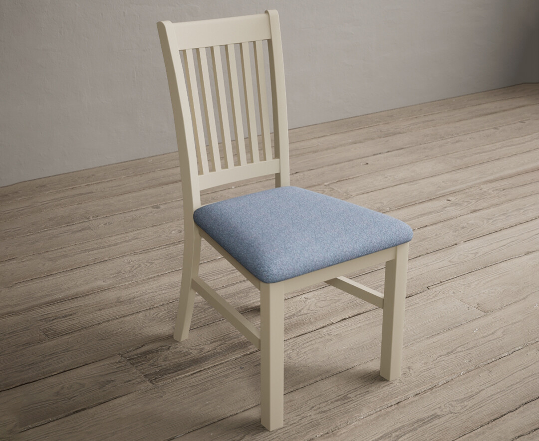 Photo 1 of Warwick cream dining chairs with blue fabric seat pad