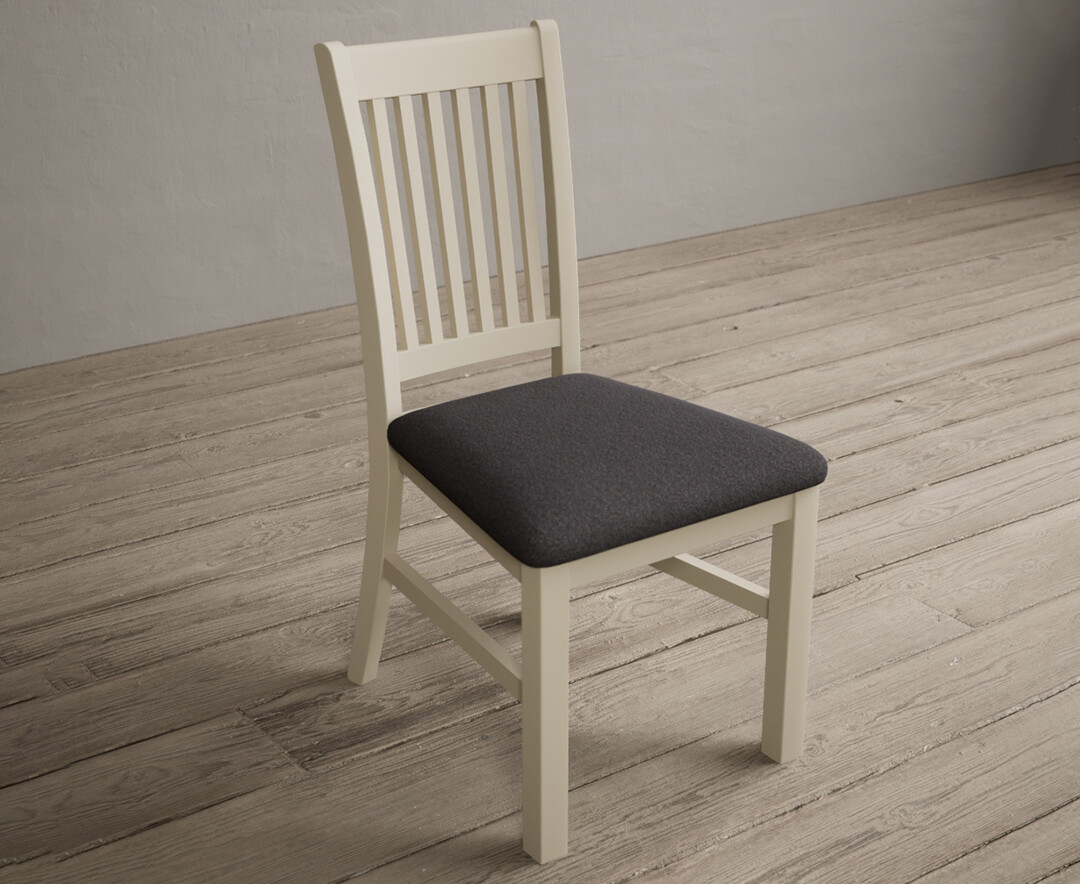 Photo 1 of Warwick cream dining chairs with charcoal grey fabric seat pad