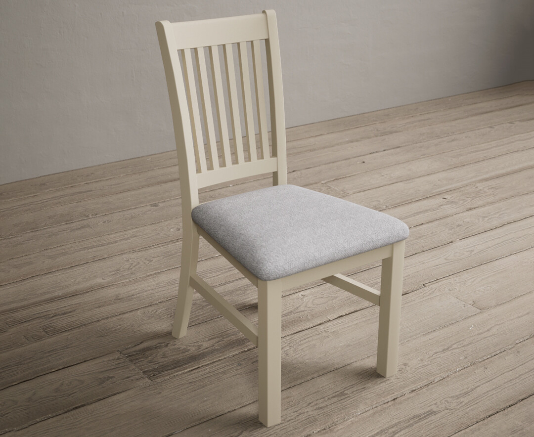 Photo 1 of Warwick cream dining chairs with light grey fabric seat pad