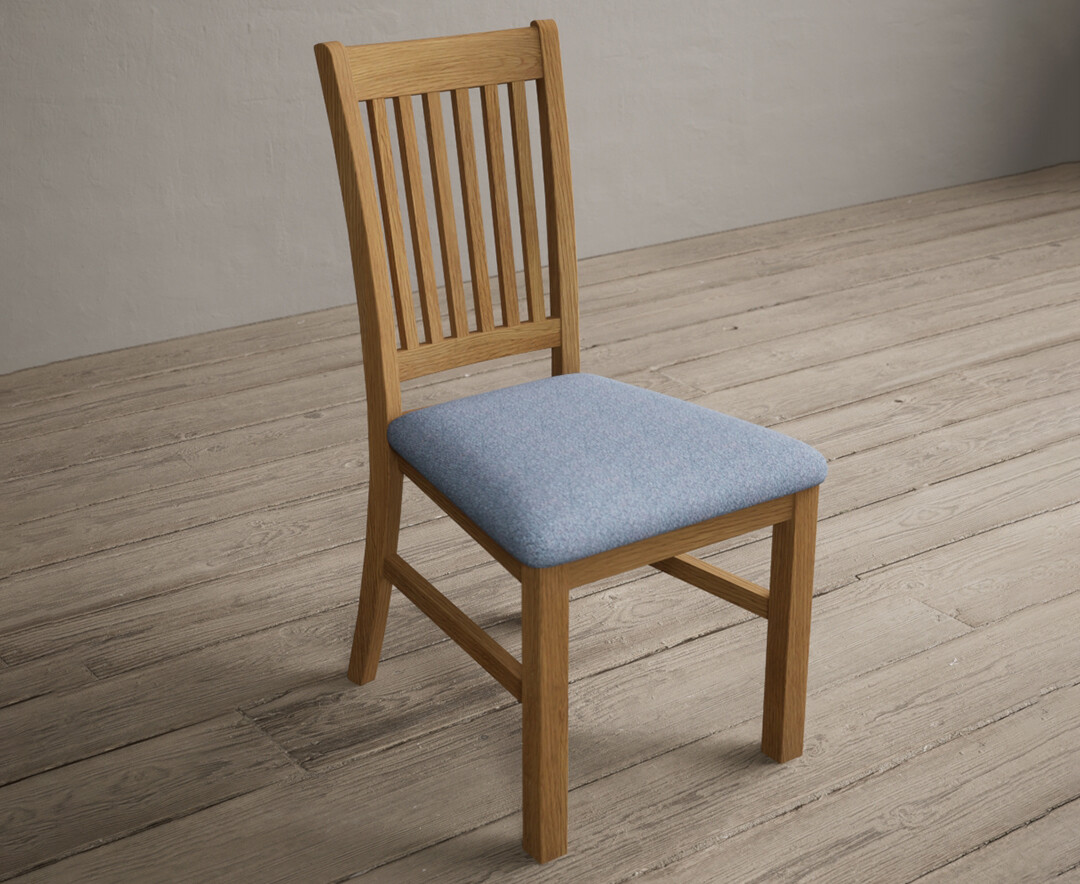 Photo 1 of Warwick solid oak dining chair with blue fabric seat pad