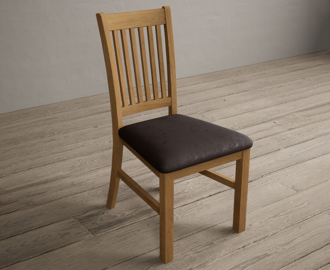 Photo 1 of Warwick solid oak dining chair with brown suede seat pad