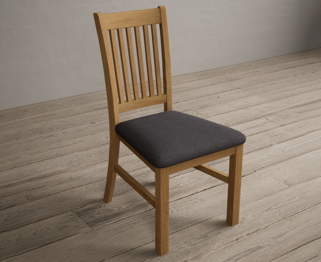 Photo 1 of Warwick solid oak dining chair with charcoal grey fabric seat pad