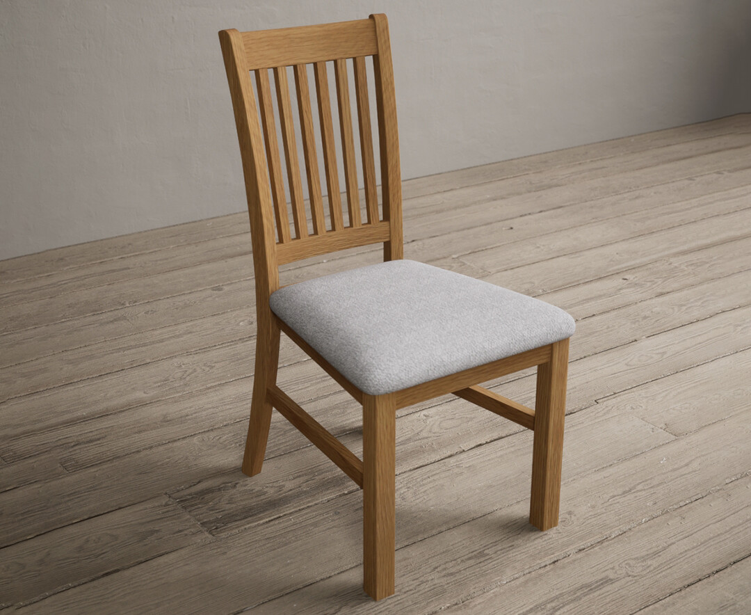 Photo 1 of Warwick solid oak dining chair with light grey fabric seat pad