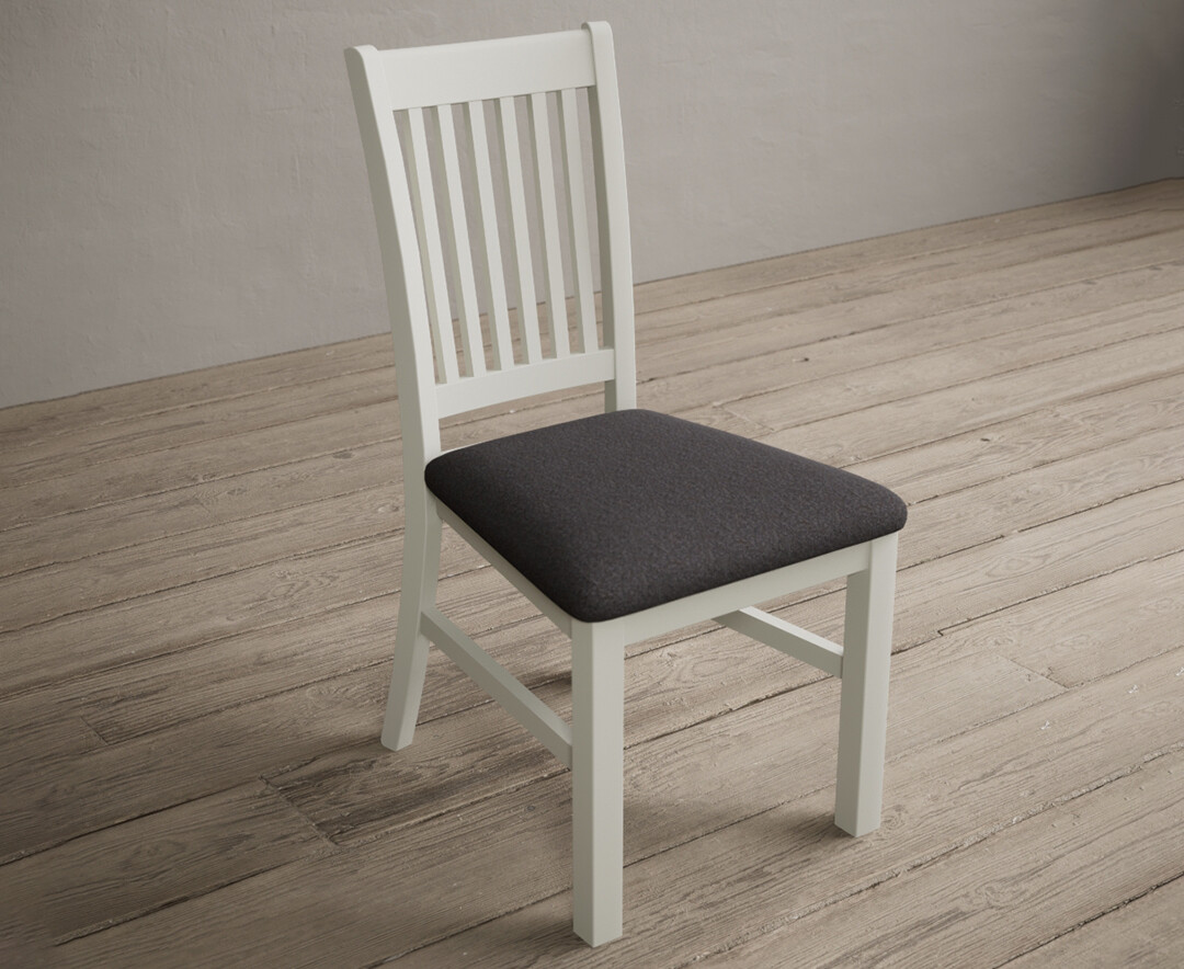 Photo 1 of Warwick signal white dining chairs with charcoal grey fabric seat pad