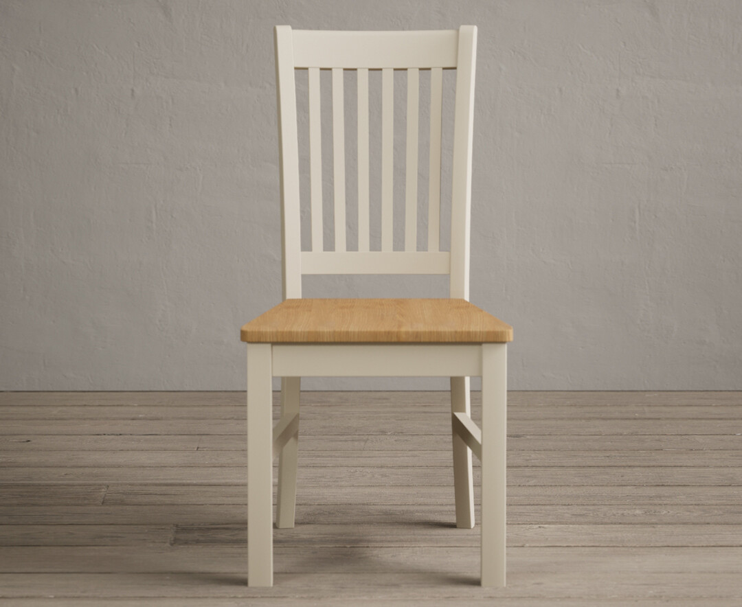 Product photograph of Warwick Cream Dining Chairs With Oak Seat Pad from Oak Furniture Superstore