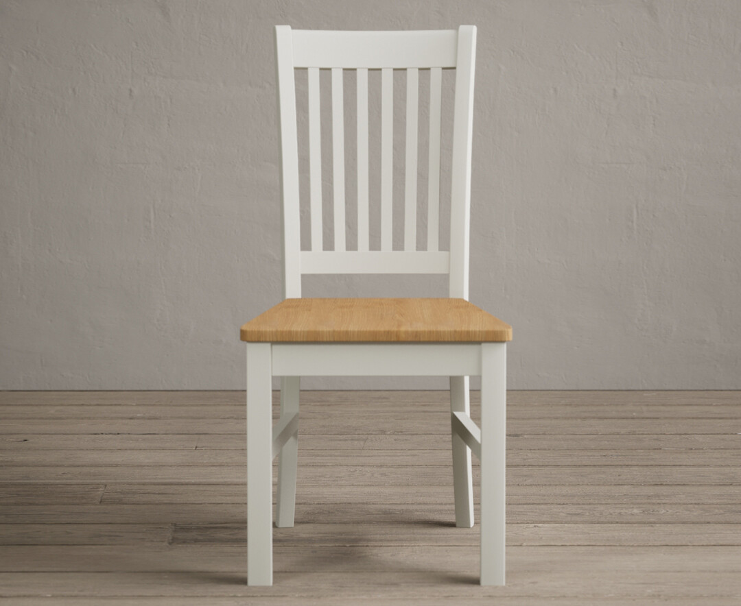 Product photograph of Warwick Signal White Dining Chairs With Oak Seat Pad from Oak Furniture Superstore