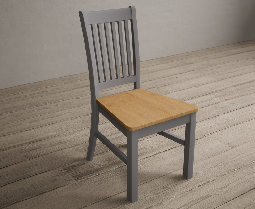 Photo 1 of Warwick light grey dining chairs with oak seat pad