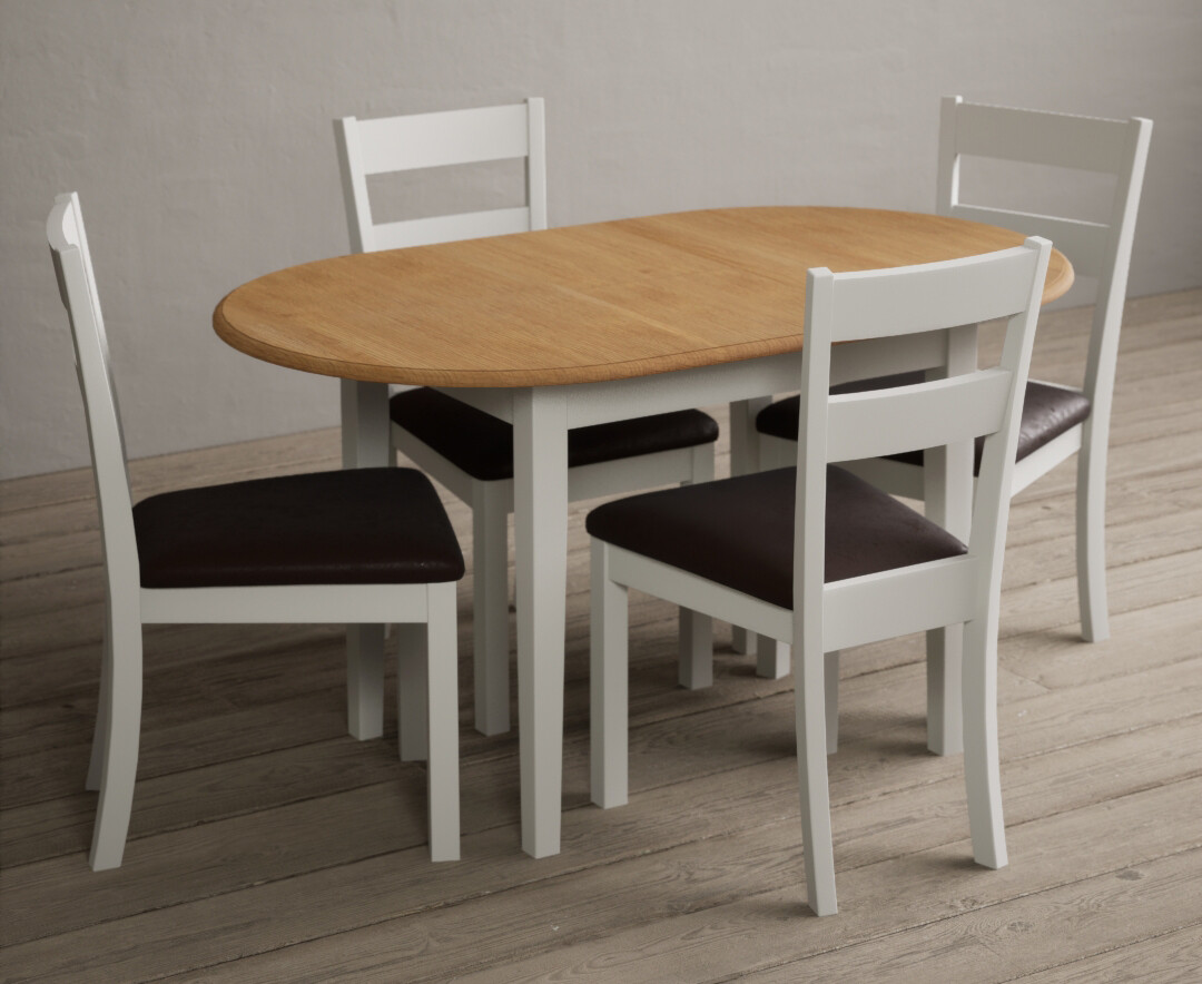 Photo 1 of Extending warwick oak and signal white painted dining table with 4 brown suede kendal chairs