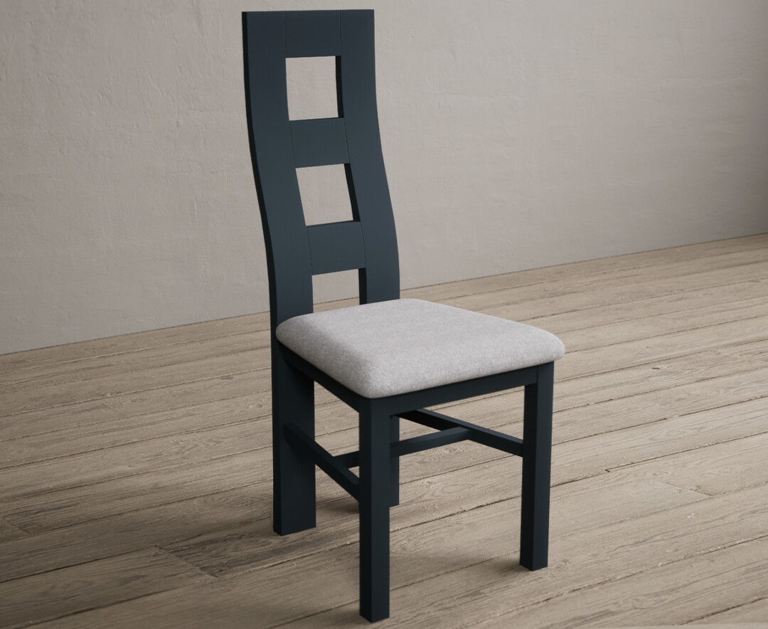 Photo 1 of Painted dark blue flow back dining chairs with light grey fabric seat pad