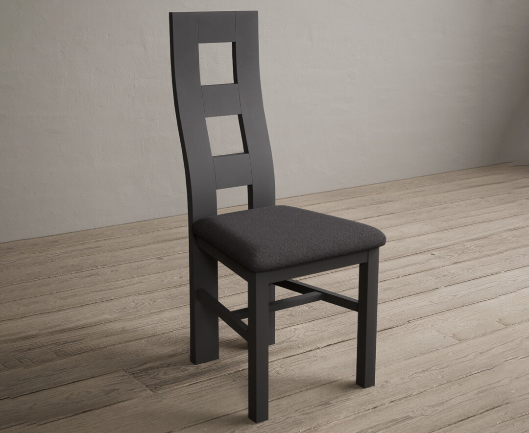 Photo 1 of Painted charcoal grey flow back dining chairs with charcoal grey fabric seat pad
