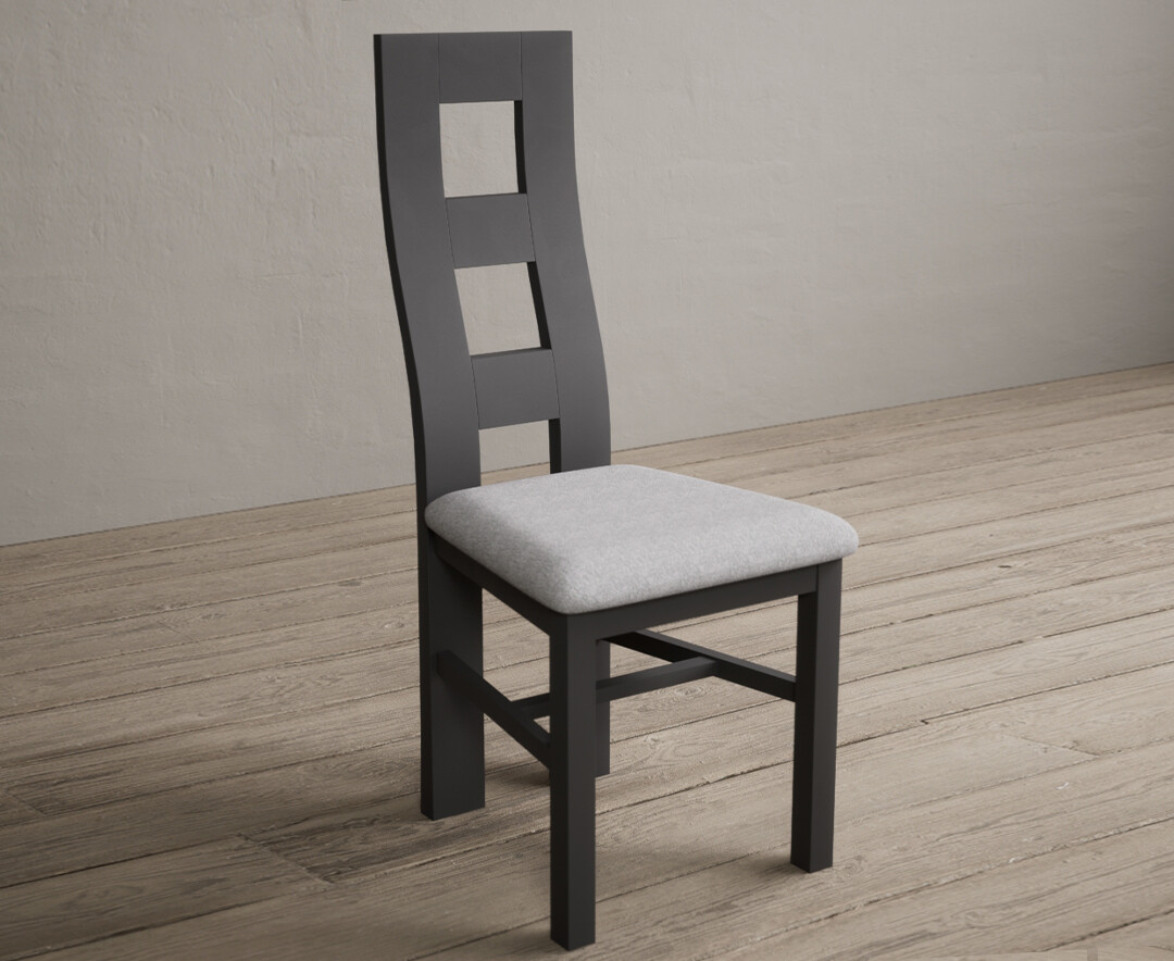 Photo 1 of Painted charcoal grey flow back dining chairs with light grey fabric seat pad