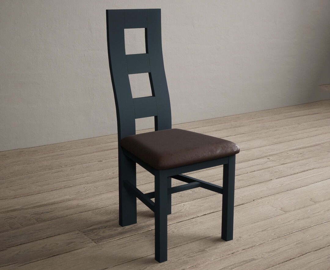 Photo 1 of Painted dark blue flow back dining chairs with brown suede seat pad