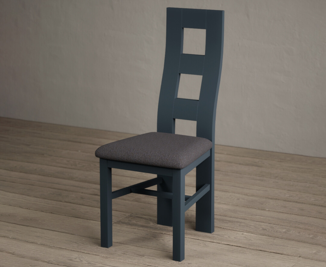 Photo 2 of Painted dark blue flow back dining chairs with charcoal grey fabric seat pad