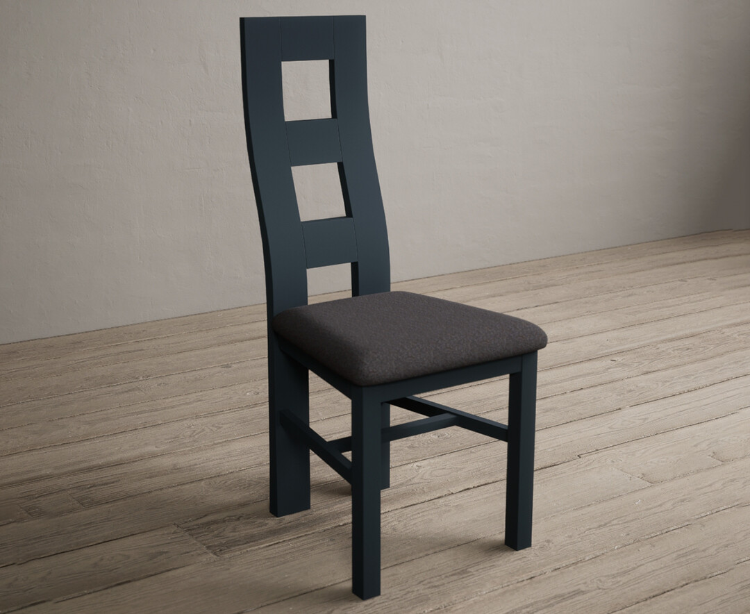 Photo 1 of Painted dark blue flow back dining chairs with charcoal grey fabric seat pad