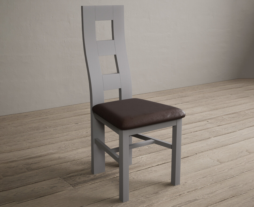 Photo 1 of Painted light grey flow back dining chairs with brown suede seat pad
