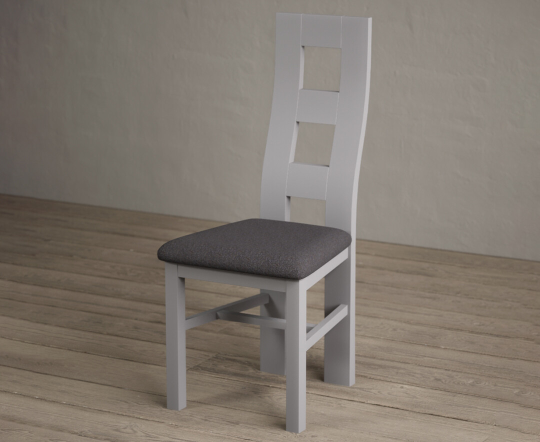 Photo 2 of Painted light grey flow back dining chairs with charcoal grey fabric seat pad