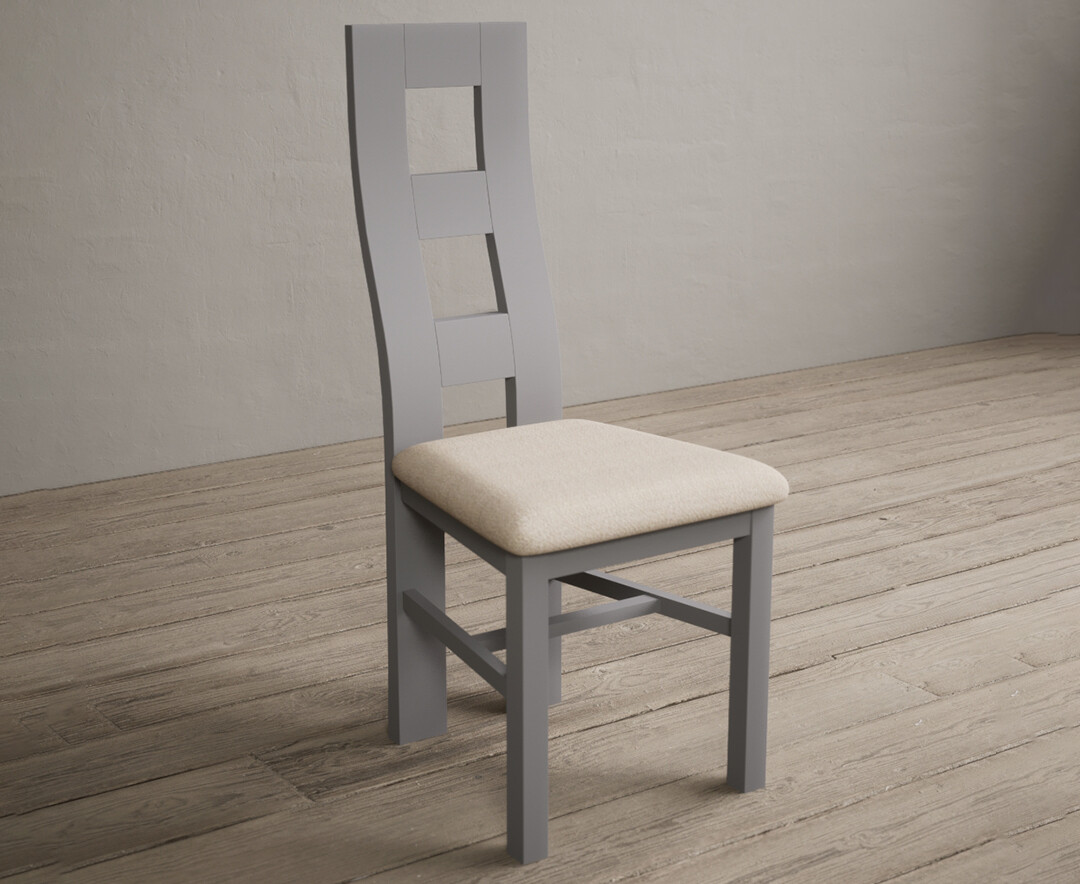 Photo 1 of Painted light grey flow back dining chairs with linen fabric seat pad
