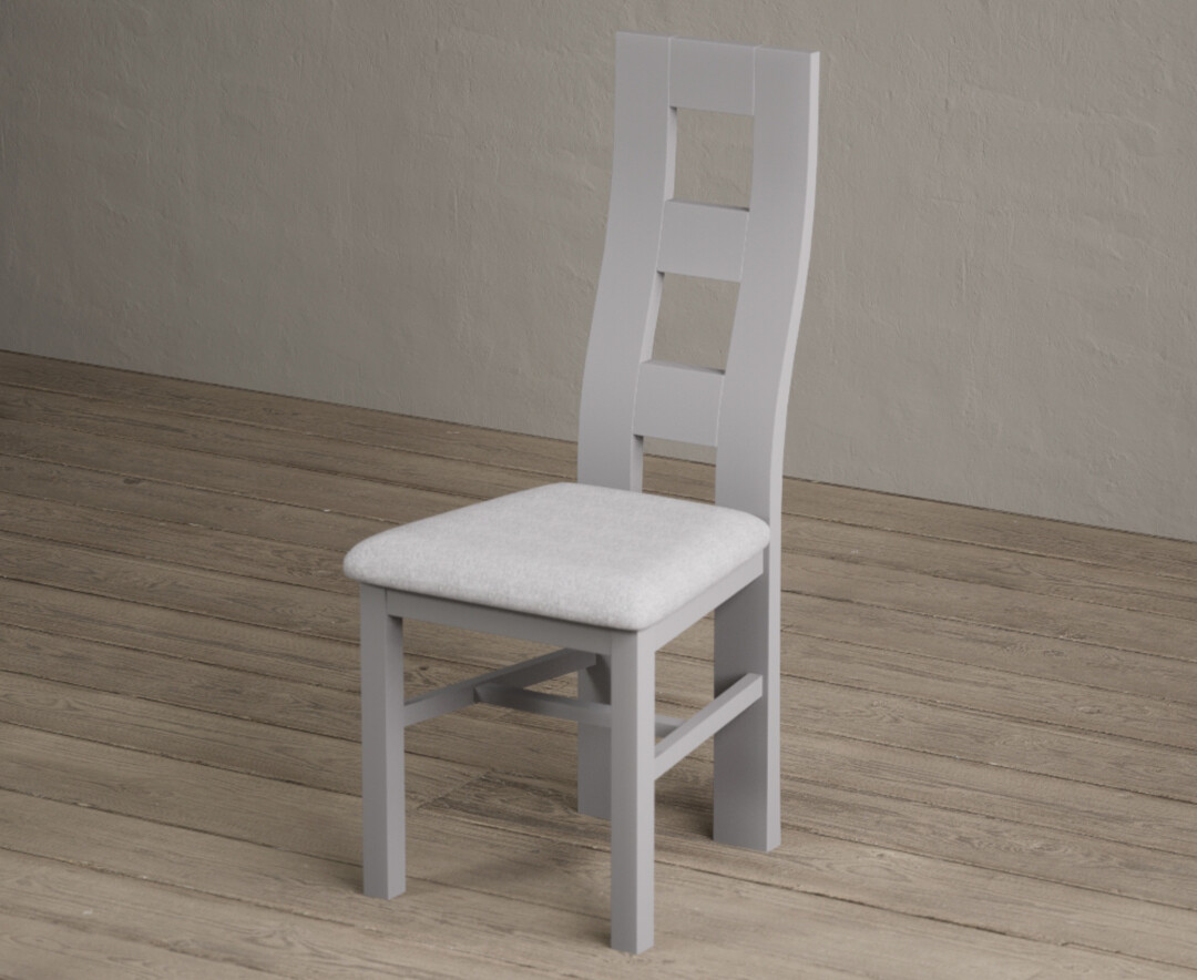 Photo 2 of Painted light grey flow back dining chairs with light grey fabric seat pad