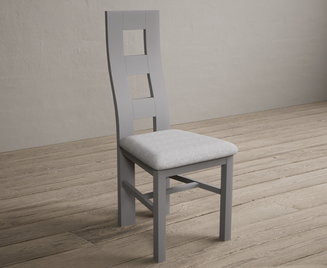 Photo 1 of Painted light grey flow back dining chairs with light grey fabric seat pad