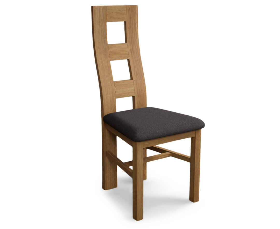 Photo 3 of Natural solid oak flow back dining chairs with charcoal grey fabric seat pad
