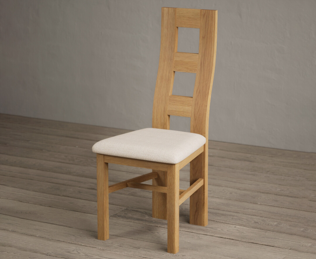 Photo 2 of Natural solid oak flow back dining chairs with linen seat pad