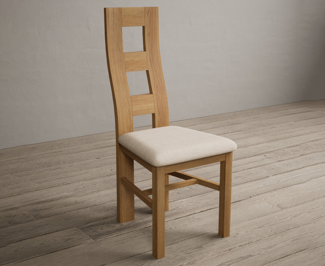 Photo 1 of Natural solid oak flow back dining chairs with linen seat pad