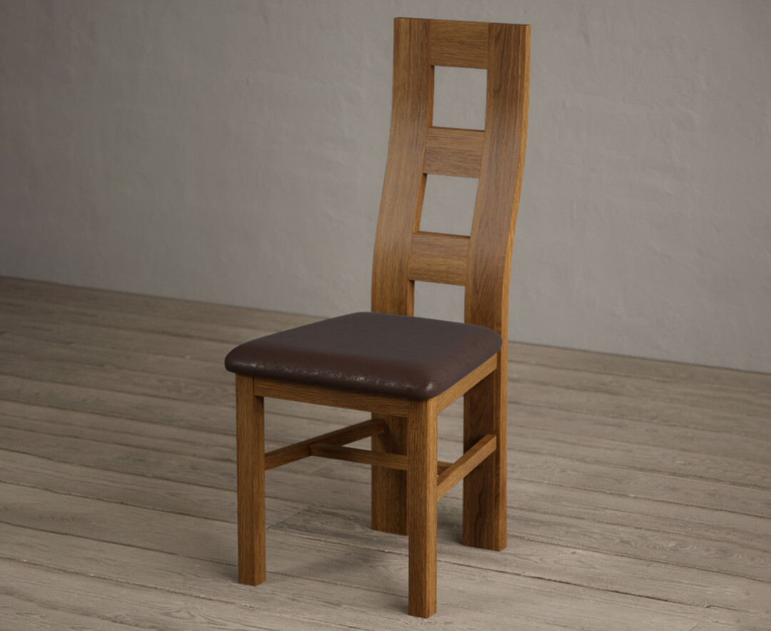 Photo 2 of Rustic solid oak flow back dining chairs with brown suede seat pad
