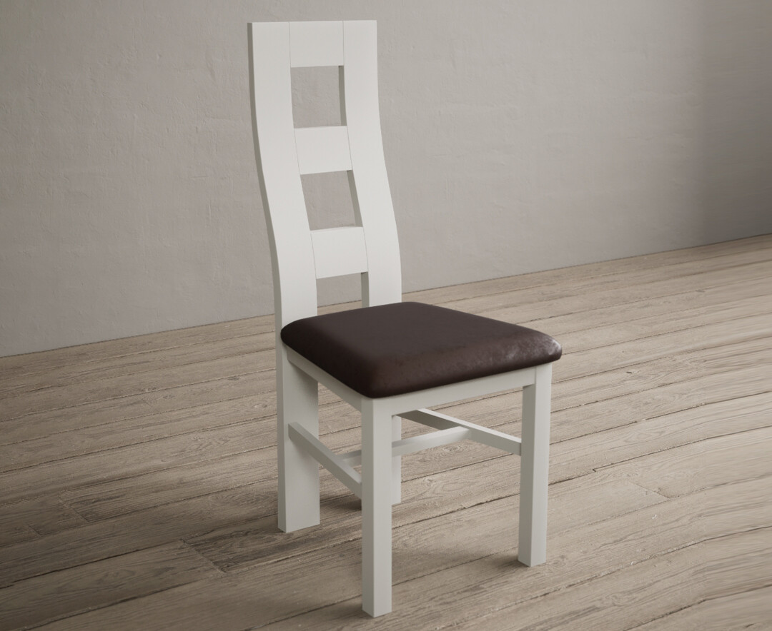 Photo 1 of Painted signal white flow back dining chairs with brown suede seat pad