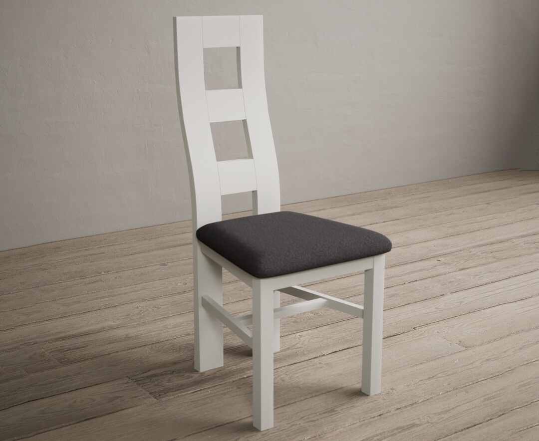 Photo 1 of Painted signal white flow back dining chairs with charcoal grey fabric seat pad