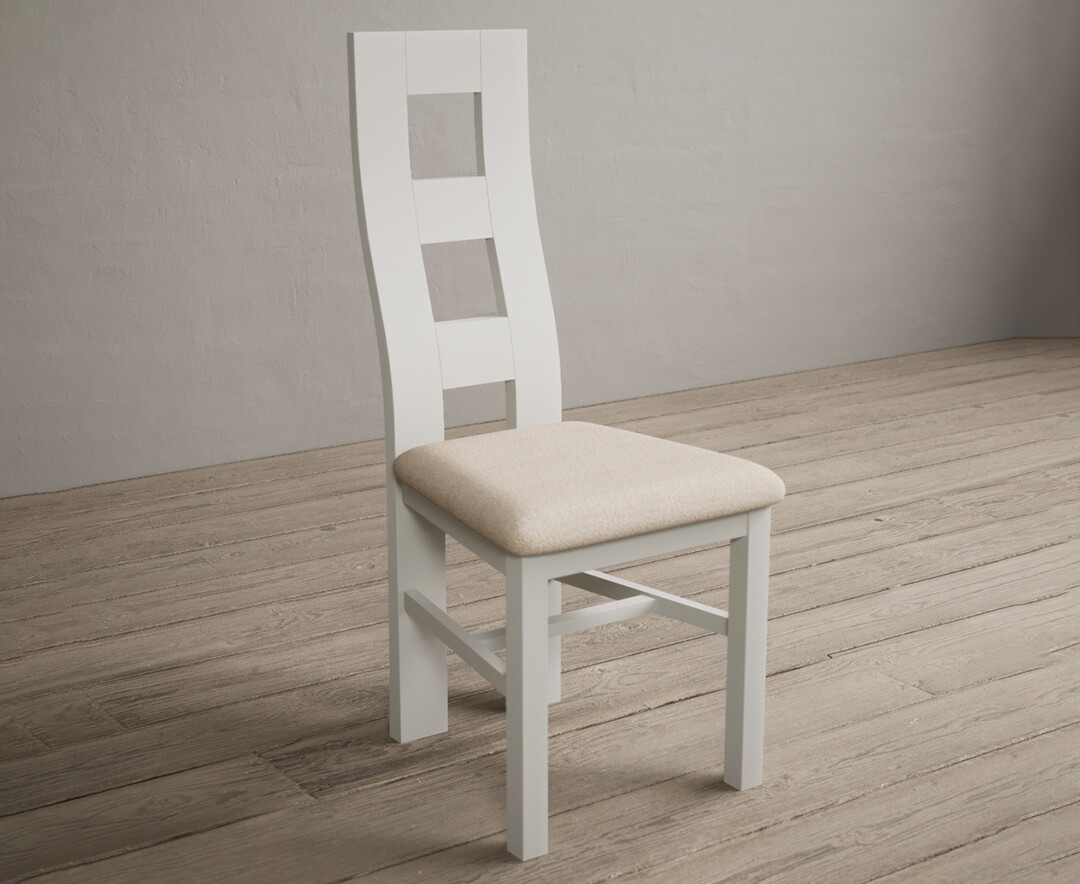 Photo 1 of Painted signal white flow back dining chairs with linen fabric seat pad