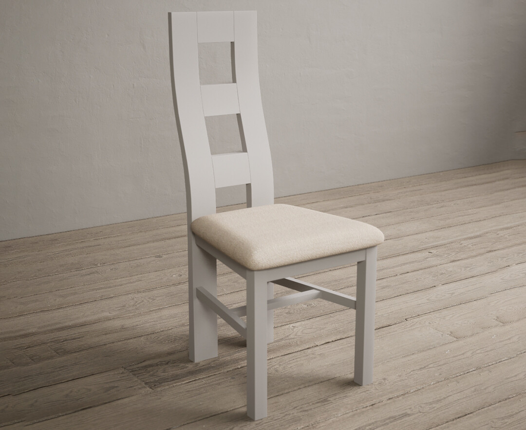Photo 1 of Painted soft white flow back dining chairs with linen fabric seat pad