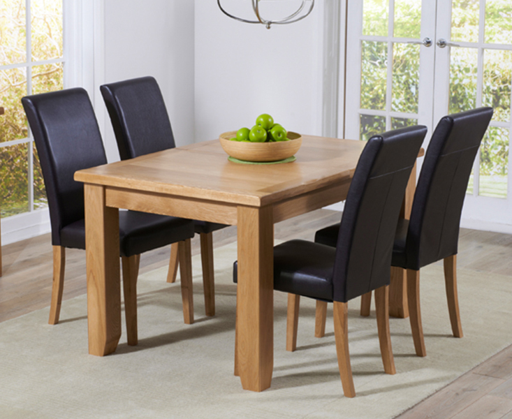 Product photograph of Extending Yateley 130cm Oak Dining Table With 4 Black Olivia Chairs from Oak Furniture Superstore