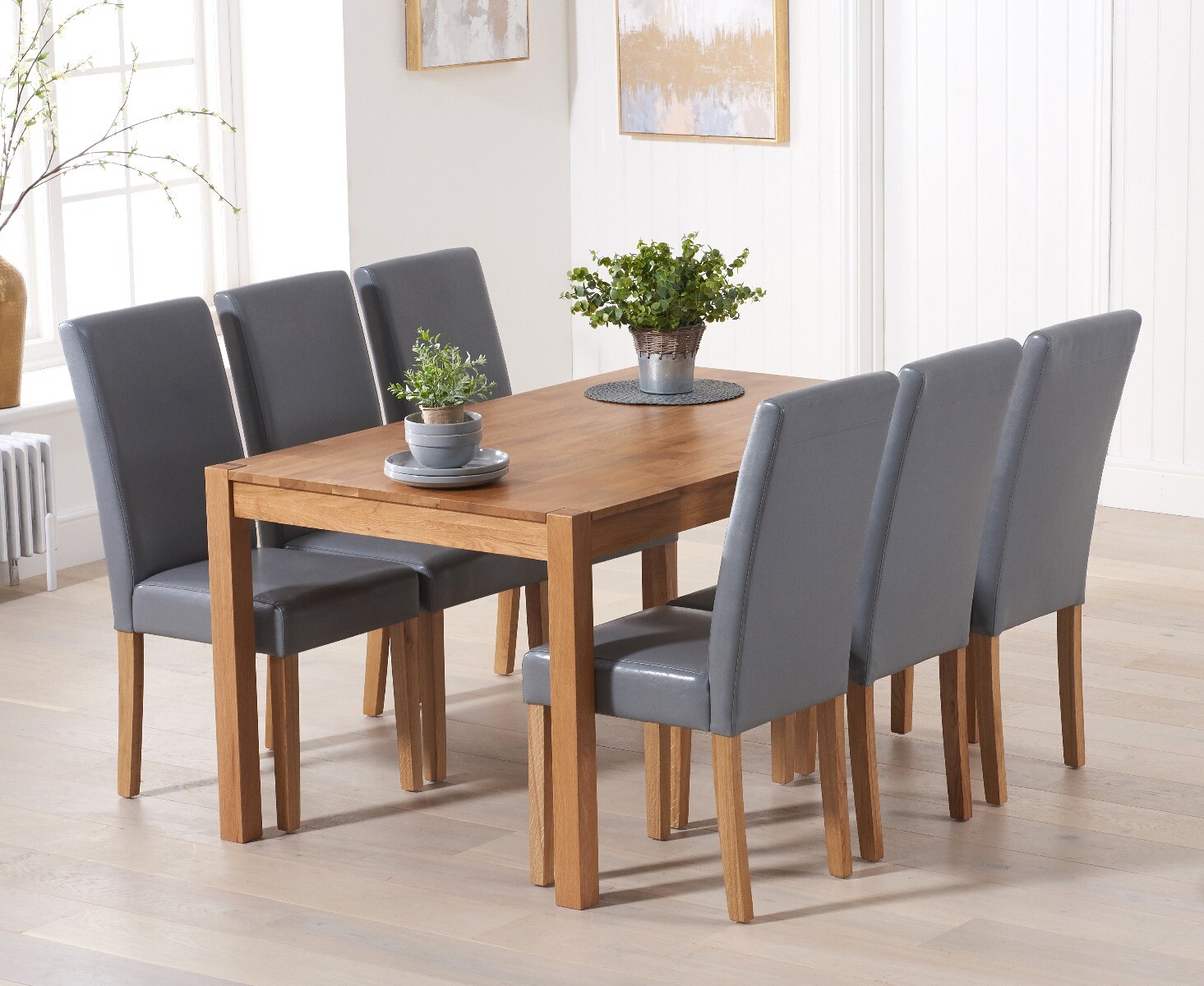 Product photograph of Oxford Solid Oak 150cm Dining Table With 6 Black Olivia Chairs from Oak Furniture Superstore