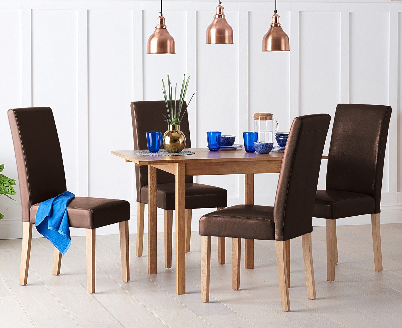 Product photograph of Extending York 70cm Solid Oak Drop Leaf Dining Table With 4 Brown Olivia Chairs from Oak Furniture Superstore