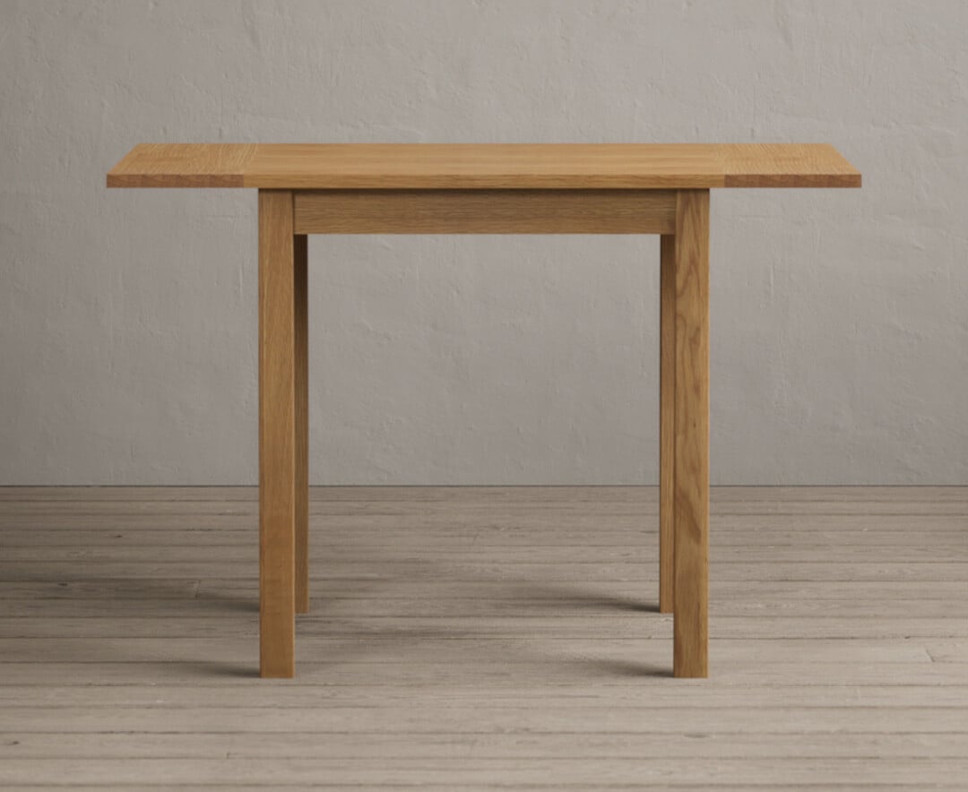 Product photograph of Extending York 70cm Solid Oak Drop Leaf Dining Table from Oak Furniture Superstore