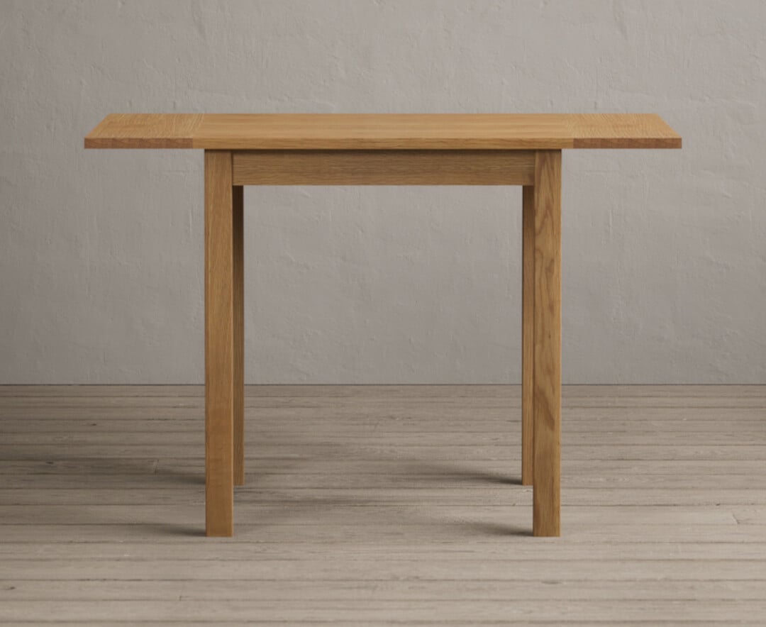 Photo 1 of Extending york 70cm solid oak drop leaf dining table