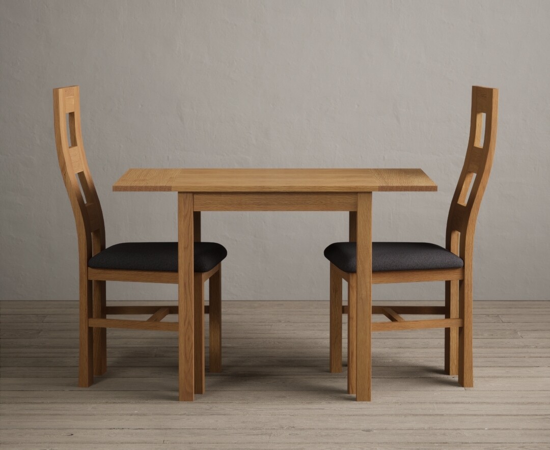 Product photograph of Extending York 70cm Solid Oak Dining Table With 2 Charcoal Grey Flow Back Chairs from Oak Furniture Superstore