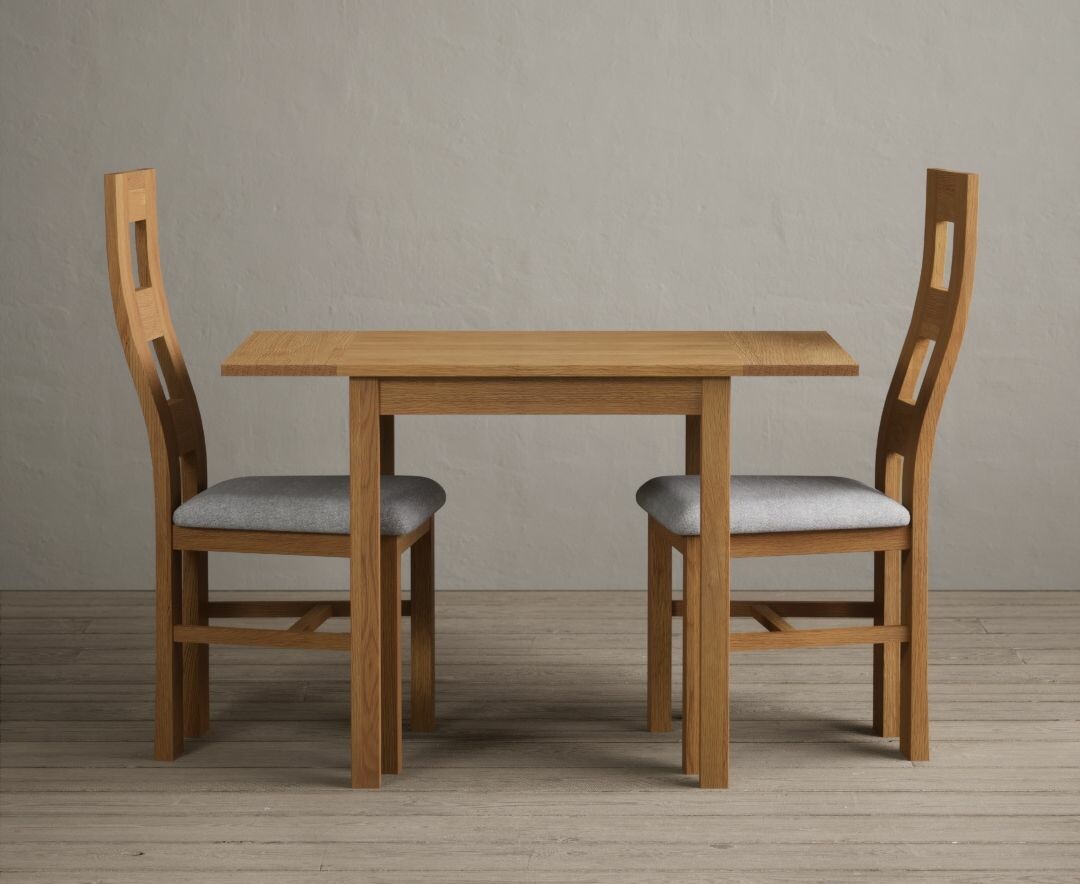 Product photograph of Extending York 70cm Solid Oak Dining Table With 2 Light Grey Flow Back Chairs from Oak Furniture Superstore
