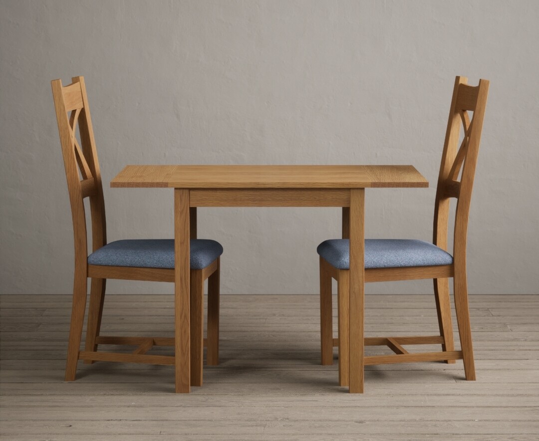 Product photograph of Extending York 70cm Solid Oak Dining Table With 2 Blue X Back Chairs from Oak Furniture Superstore