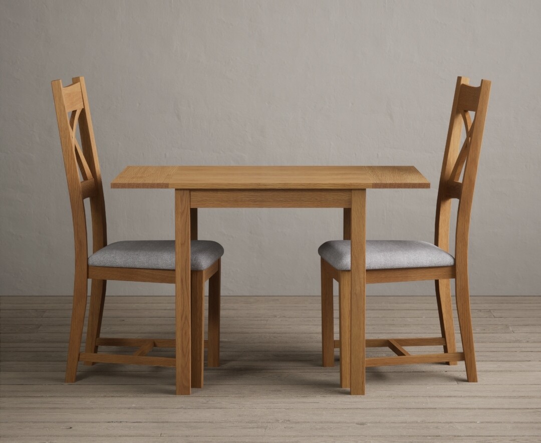 Product photograph of Extending York 70cm Solid Oak Dining Table With 2 Light Grey X Back Chairs from Oak Furniture Superstore