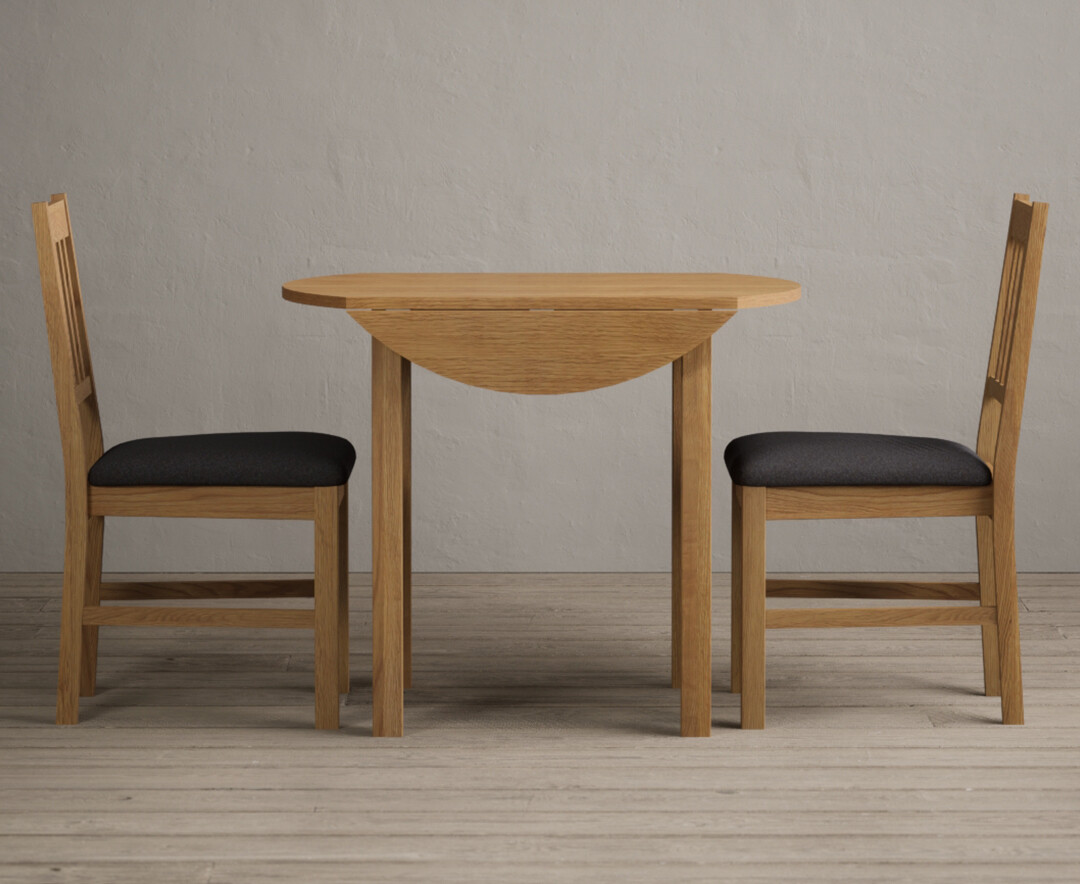 Photo 1 of Extending york 90cm solid oak dining table with 4 brown york chairs