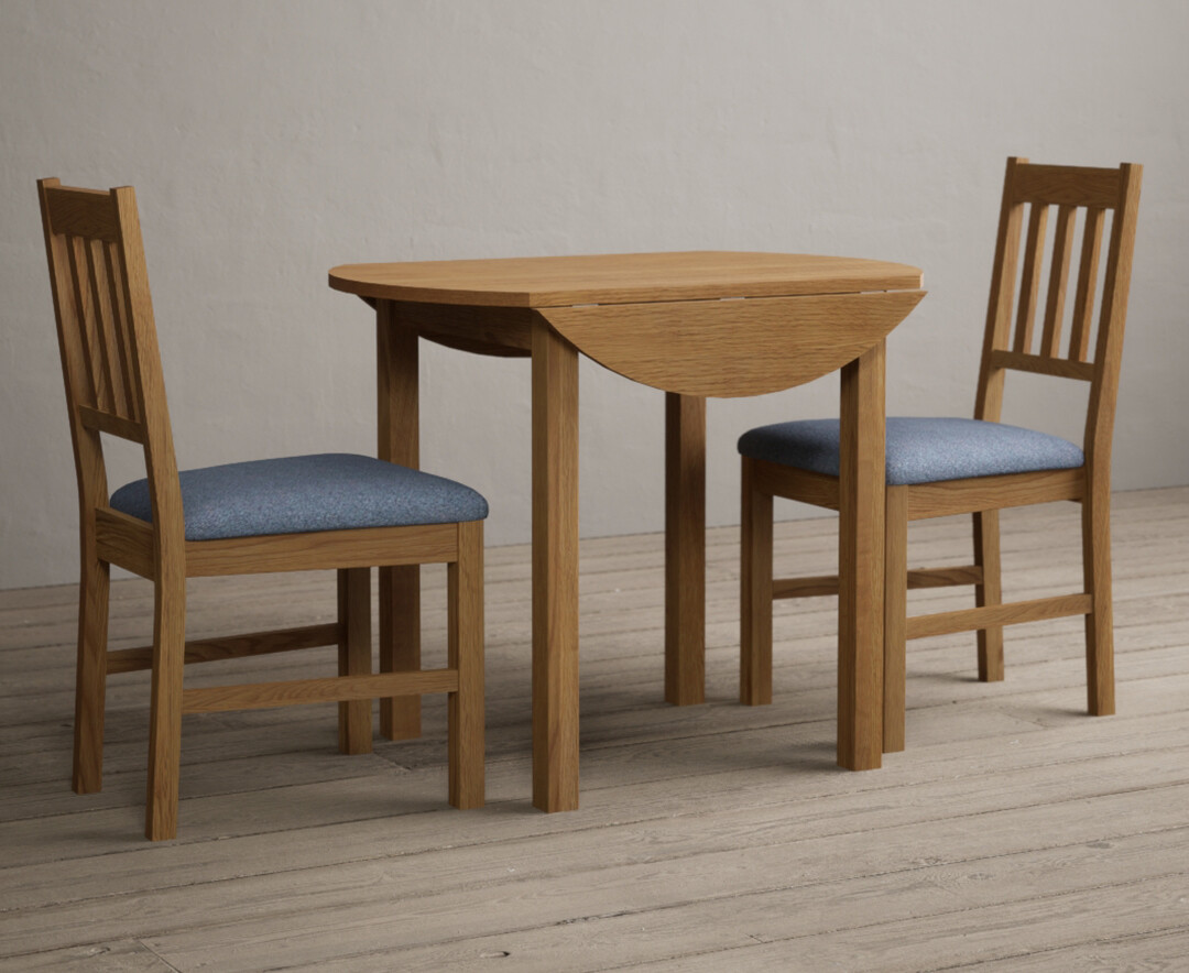 Photo 1 of Extending york 90cm solid oak dining table with 4 blue york chairs