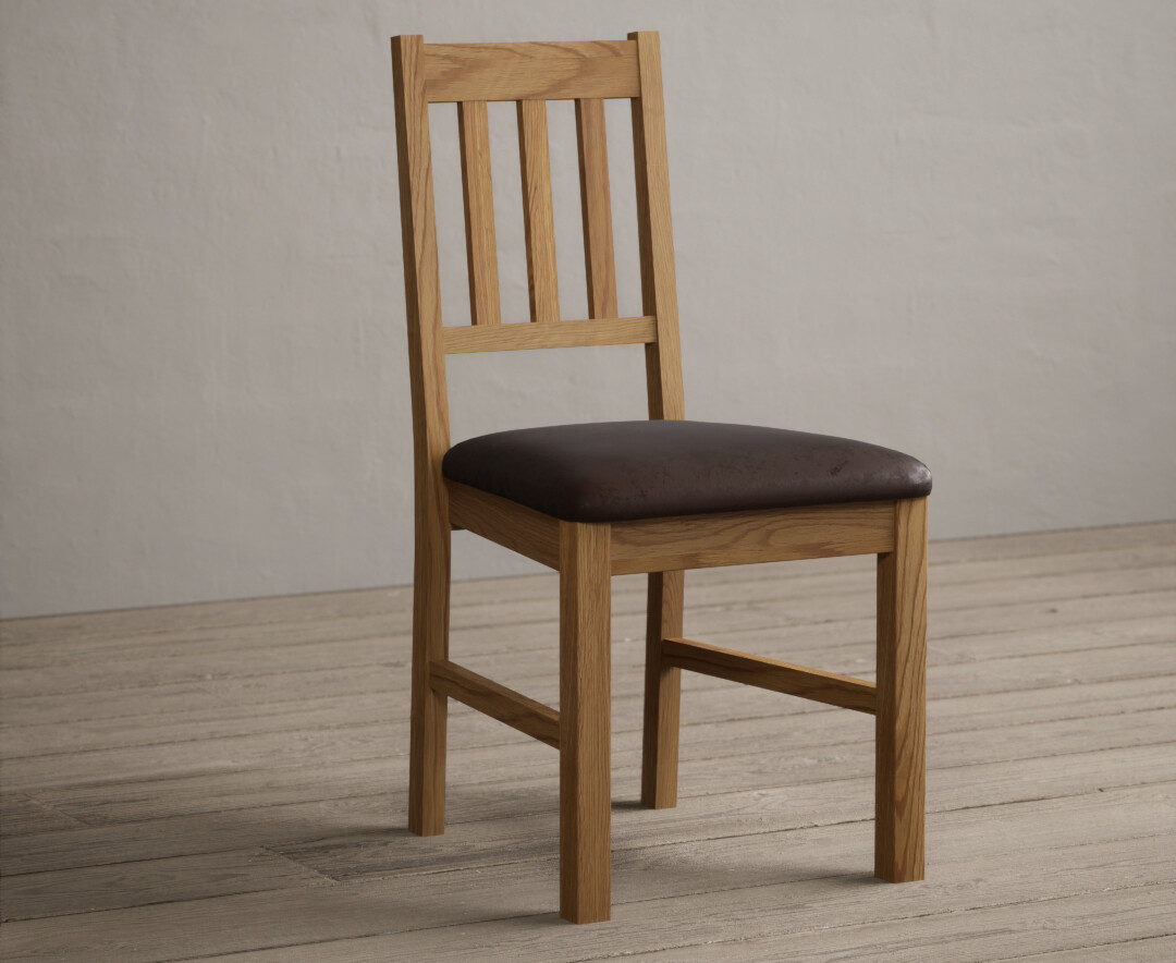 Product photograph of York Solid Oak Dining Chairs With Brown Suede Seat Pad from Oak Furniture Superstore.
