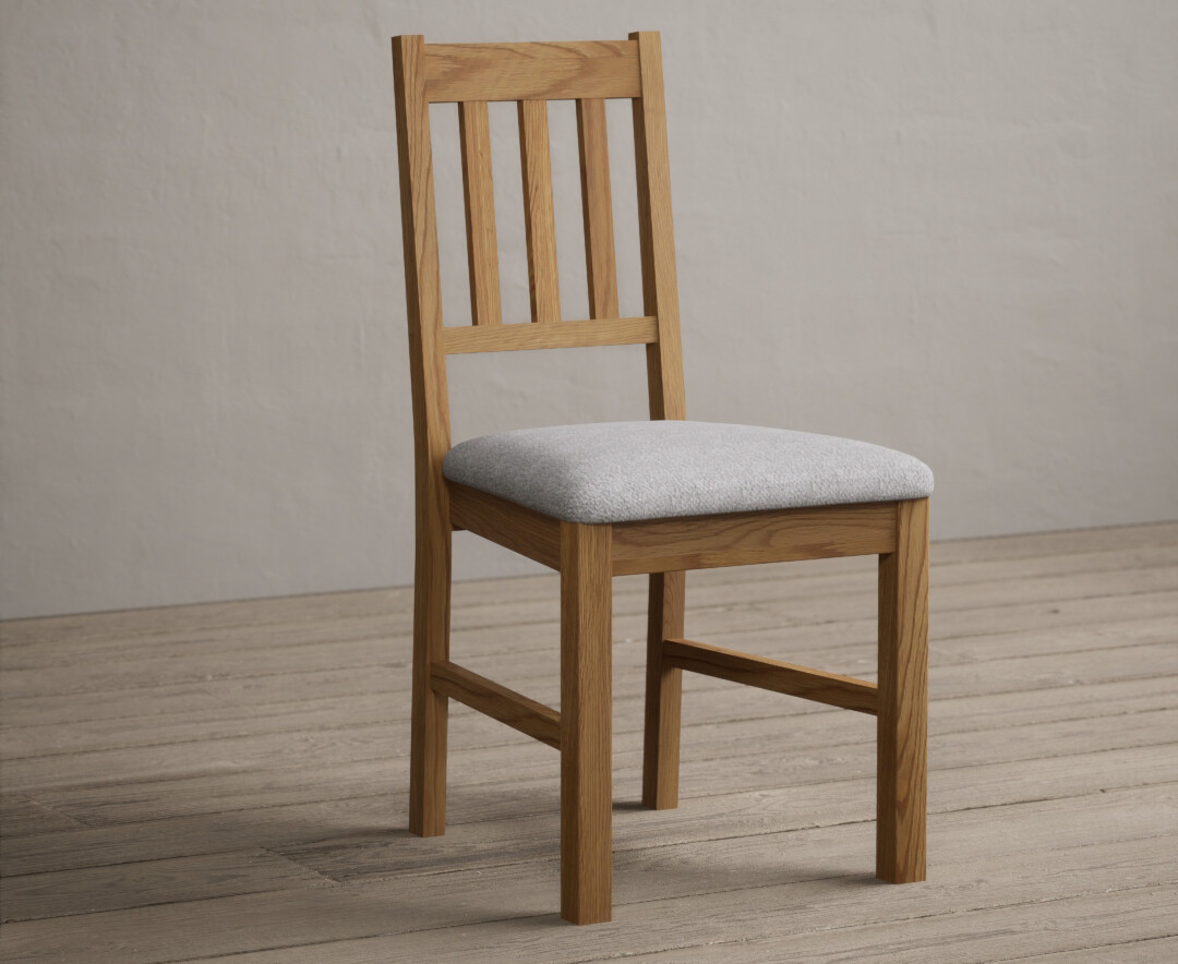Photo 1 of York solid oak dining chairs with light grey fabric seat pad