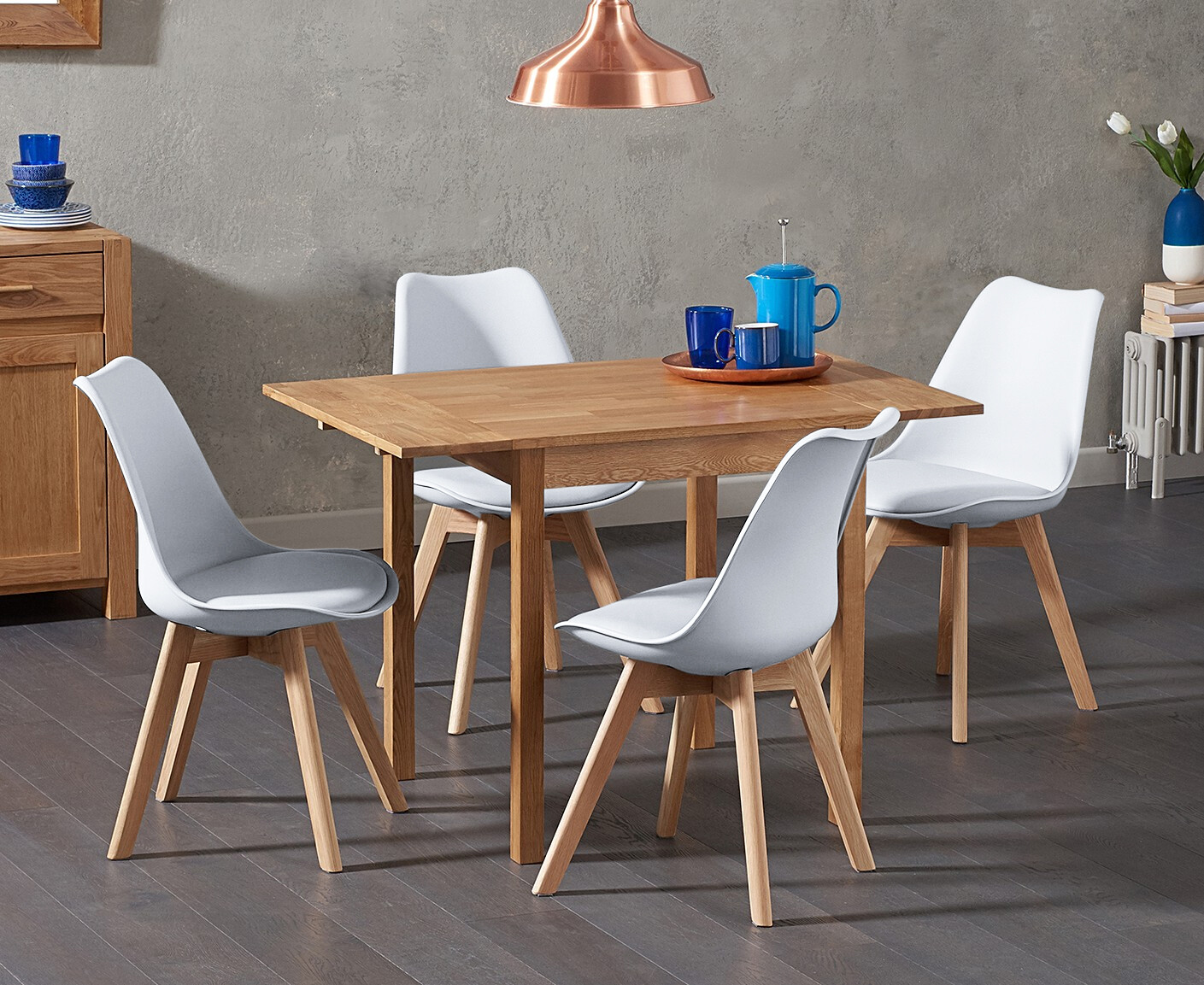 Product photograph of Extending York 70cm Solid Oak Drop Leaf Dining Table With 4 White Orson Chairs from Oak Furniture Superstore